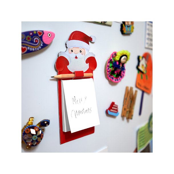 KLAUS Christmas magnet with Santa Claus design.